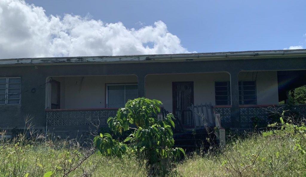 1.116 acre of land with residential building at Camps Estate