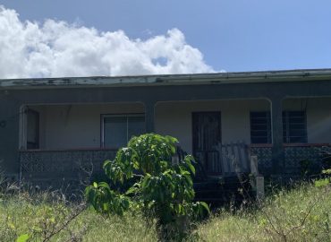 1.116 acre of land with residential building at Camps Estate